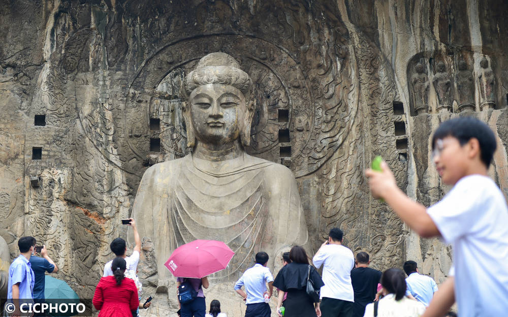 河南洛IM电竞 IM电竞平台阳：赏龙门石窟千年石刻艺术(图4)